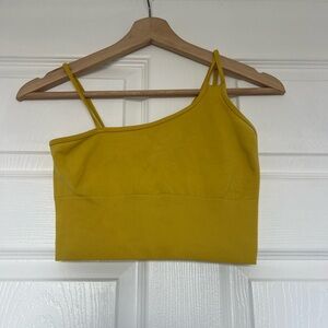Alo Yoga Offset Seamless Longline sports bra  in a yellow color. Size small